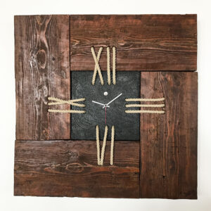 wall clock in wood cement and rope